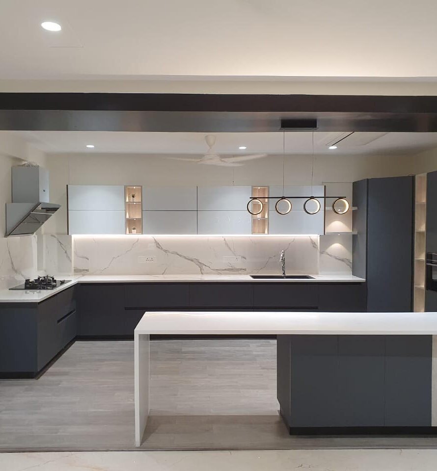 Modern modular kitchen interior designed by Ambikraft Interiors in Bhubaneswar
